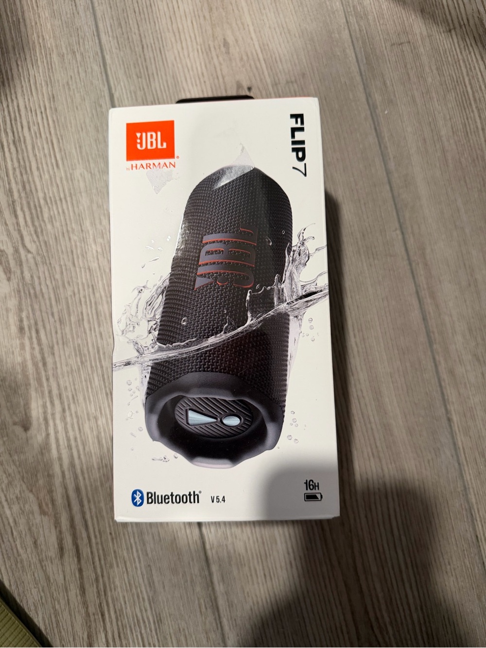 JBL Flip 7 Portable Bluetooth Speaker - Black with Red Accents